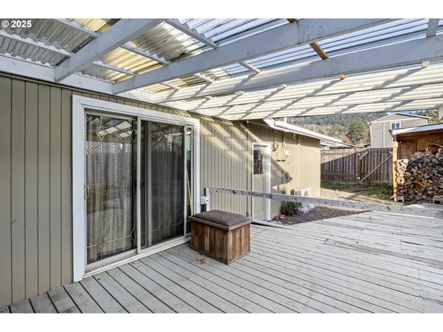 a view of a backyard with sitting area