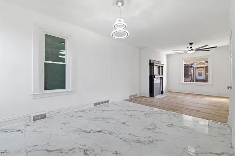 a kitchen with stainless steel appliances a refrigerator stove and sink
