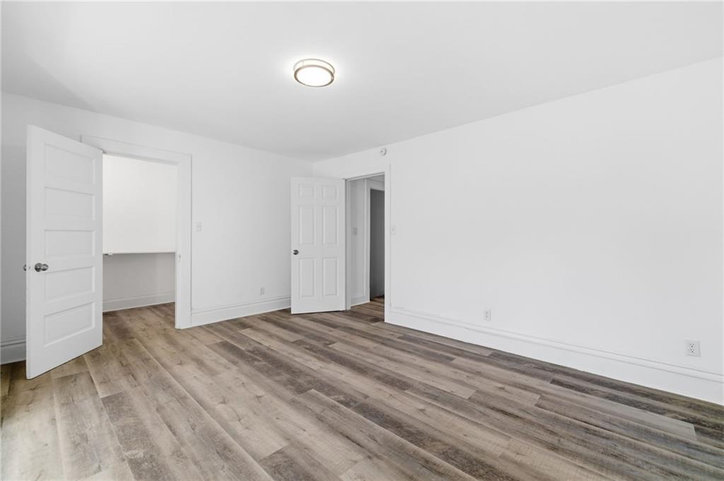 3707 Atkins Street Pittsburgh, PA 15212 - Photo 30 of 41 a view of an empty room with wooden floor