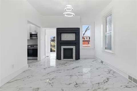 a view of a livingroom with a fireplace