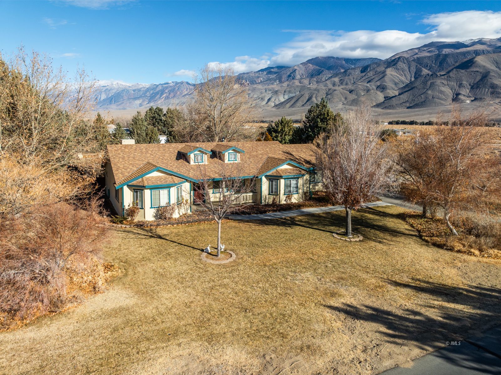 68 Ronda Lane Bishop, CA 93514 - Photo 1 of 28 a view of a houses with a snow