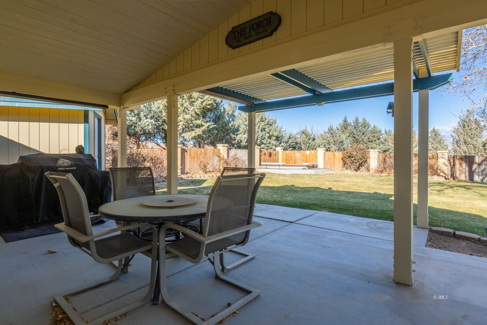 68 Ronda Lane Bishop, CA 93514 - Photo 13 of 28 a view of a porch with furniture and a yard