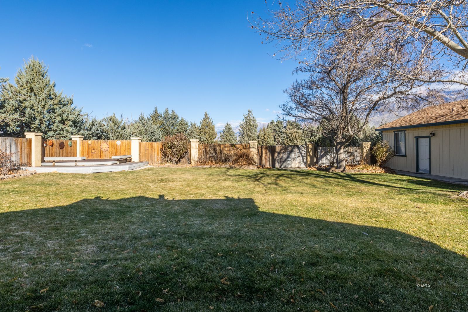 68 Ronda Lane Bishop, CA 93514 - Photo 15 of 28 a swimming pool with outdoor seating and yard