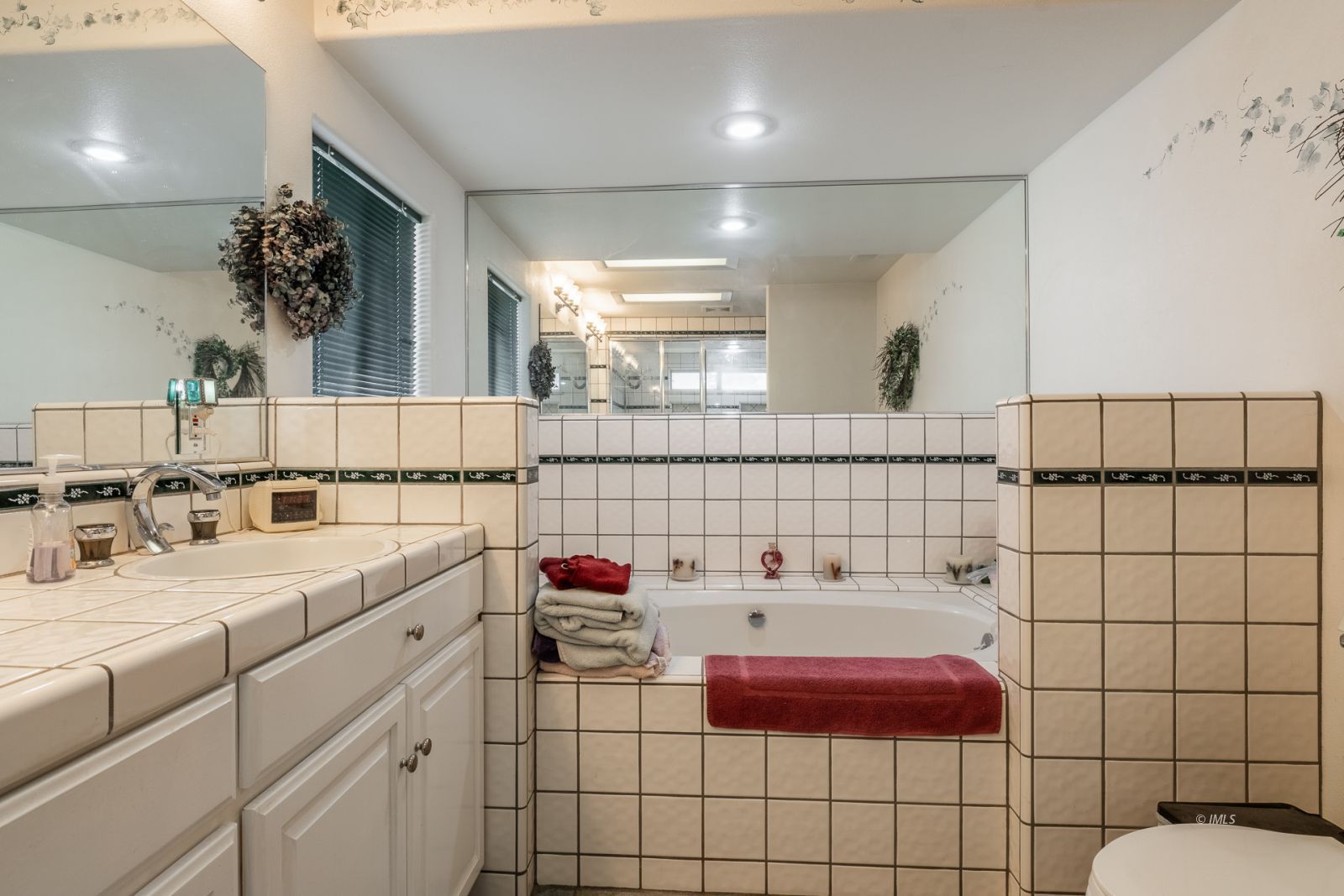 68 Ronda Lane Bishop, CA 93514 - Photo 18 of 28 a bathroom with a sink and a shower