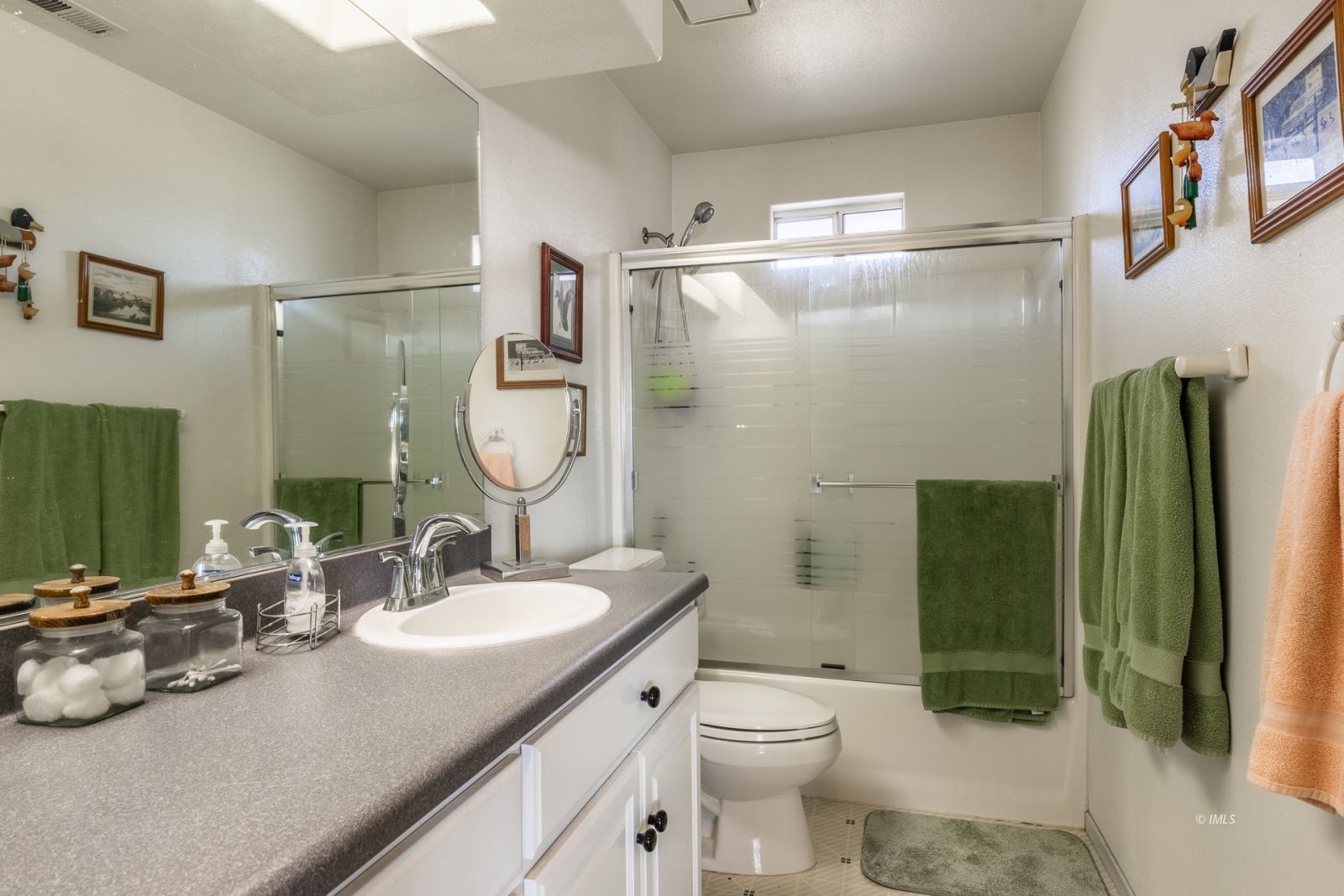 68 Ronda Lane Bishop, CA 93514 - Photo 24 of 28 a bathroom with a sink toilet and shower