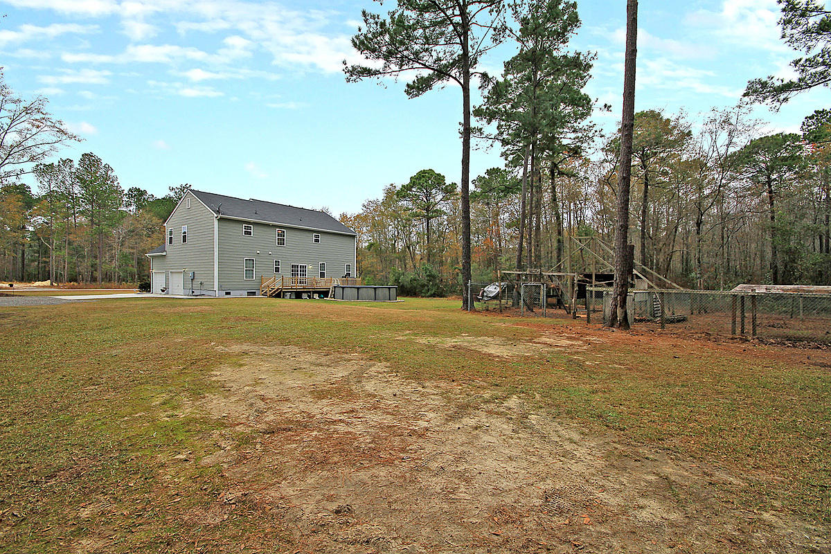 225 Deer Ridge Court Huger, SC 29450 - Photo 28 of 40 225 Deer Ridge rear view toward house