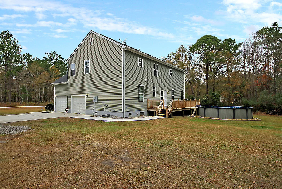 225 Deer Ridge Court Huger, SC 29450 - Photo 29 of 40 225 Deer Ridge side rear view close