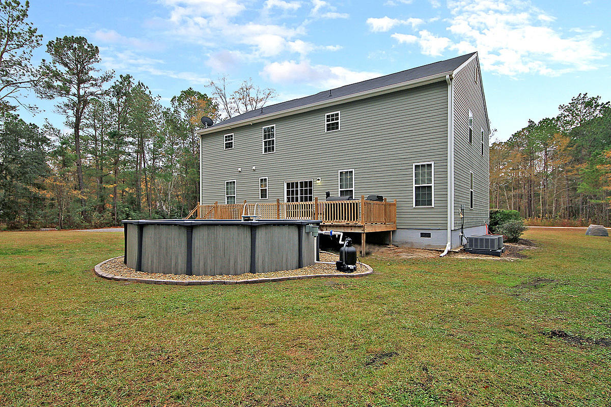 225 Deer Ridge Court Huger, SC 29450 - Photo 31 of 40 225 Deer Ridge rear view poolside