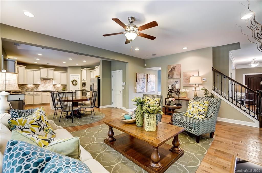 692 Old Cove Road Tega Cay, SC 29708 - Photo 11 of 44 a living room with furniture and kitchen view