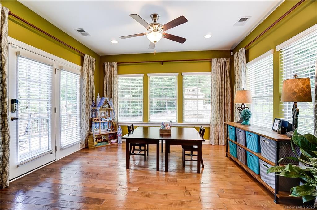 692 Old Cove Road Tega Cay, SC 29708 - Photo 18 of 44 a view of a livingroom with furniture window and wooden floor