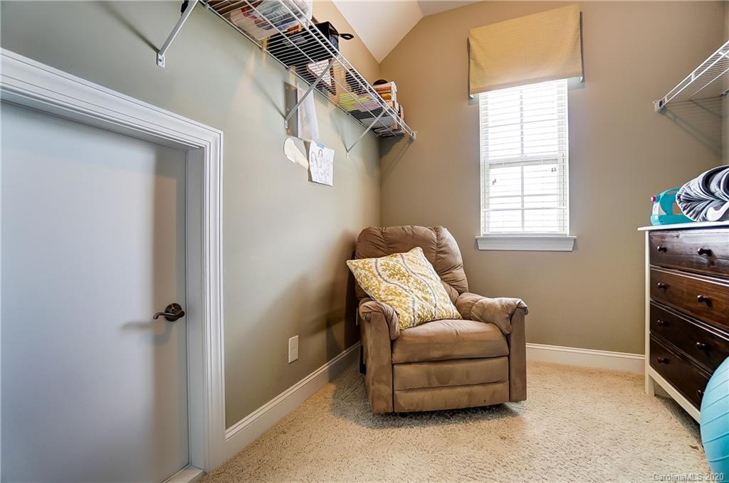 692 Old Cove Road Tega Cay, SC 29708 - Photo 28 of 44 a living room with furniture and a window