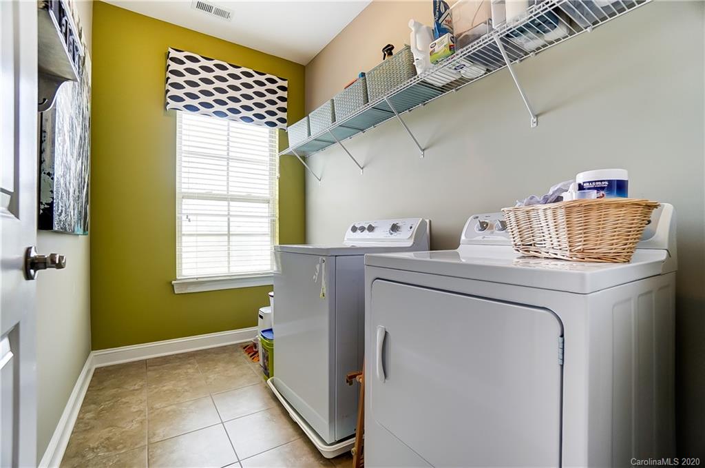 692 Old Cove Road Tega Cay, SC 29708 - Photo 33 of 44 a utility room with dryer and washer