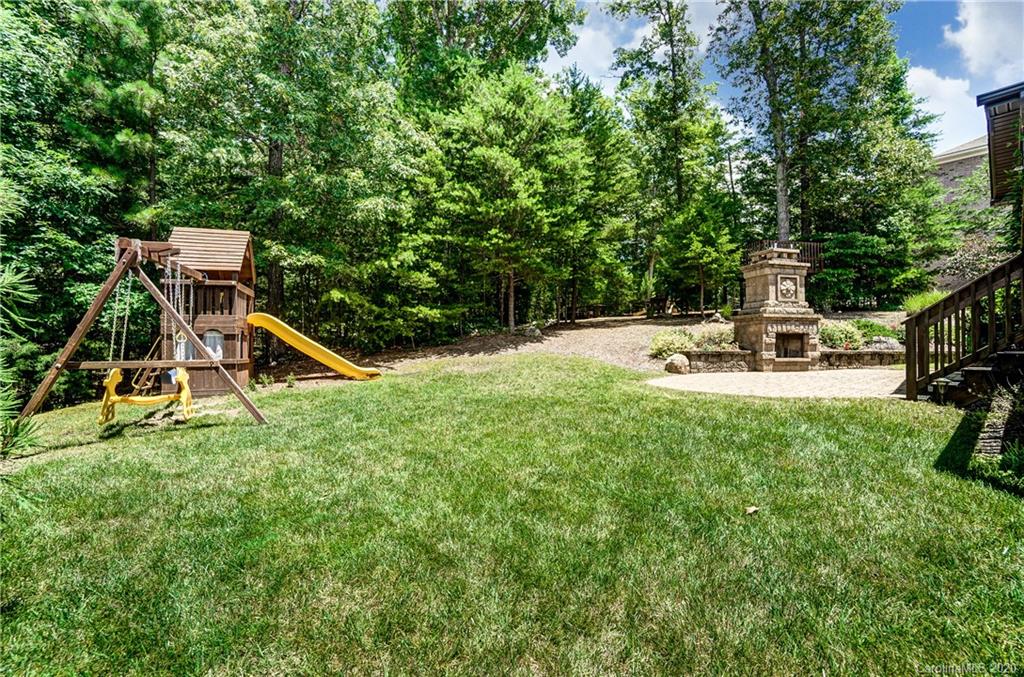 692 Old Cove Road Tega Cay, SC 29708 - Photo 40 of 44 a view of a park with slide