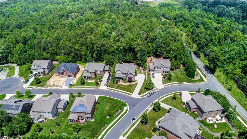692 Old Cove Road Tega Cay, SC 29708 - Photo 42 of 44 an aerial view of residential house with outdoor space and trees all around