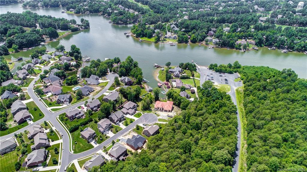 692 Old Cove Road Tega Cay, SC 29708 - Photo 43 of 44 an aerial view of a houses with a lake view