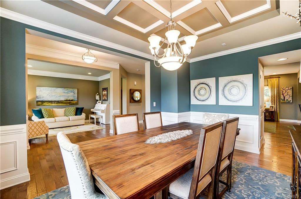 692 Old Cove Road Tega Cay, SC 29708 - Photo 8 of 44 a dining room with a table and chairs