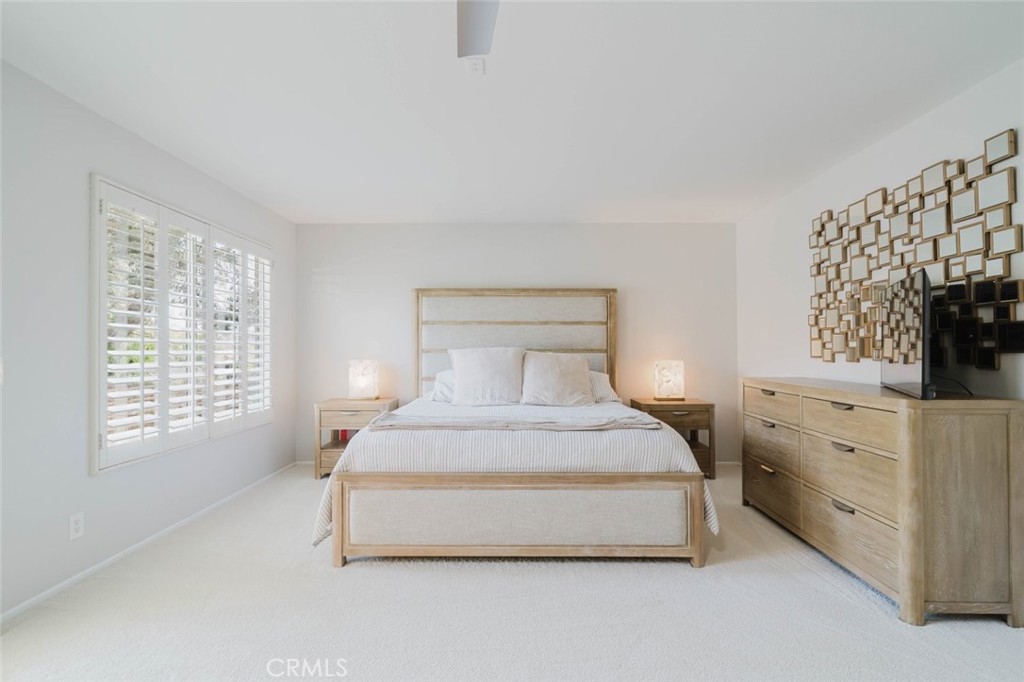 32480 The Old Road Castaic, CA 91384 - Photo 40 of 68 a spacious bedroom with a bed and a window