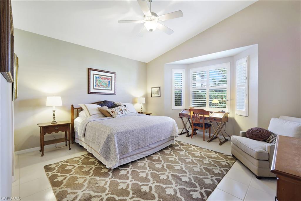 9354 Springview Loop Estero, FL 33928 - Photo 15 of 30 a bed room with a bed and a couch