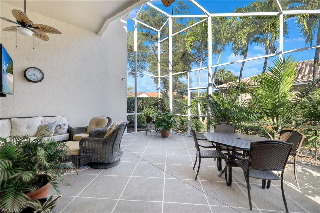 9354 Springview Loop Estero, FL 33928 - Photo 23 of 30 a view of a chairs and table in a patio