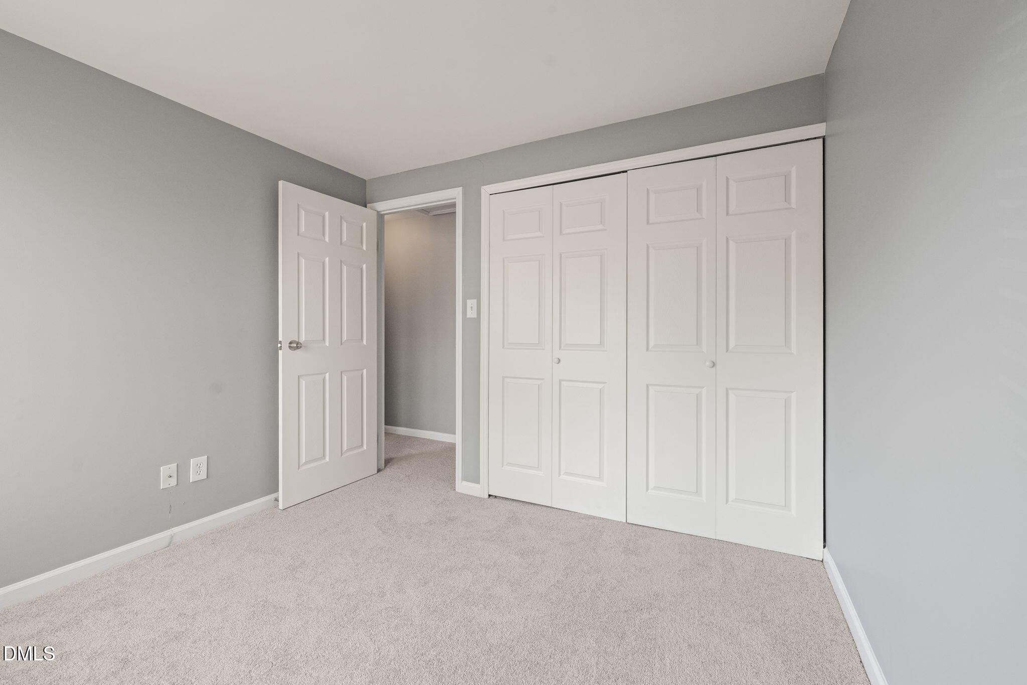 7739 Ohmann Court Raleigh, NC 27615 - Photo 26 of 38 a view of an empty room and closet area