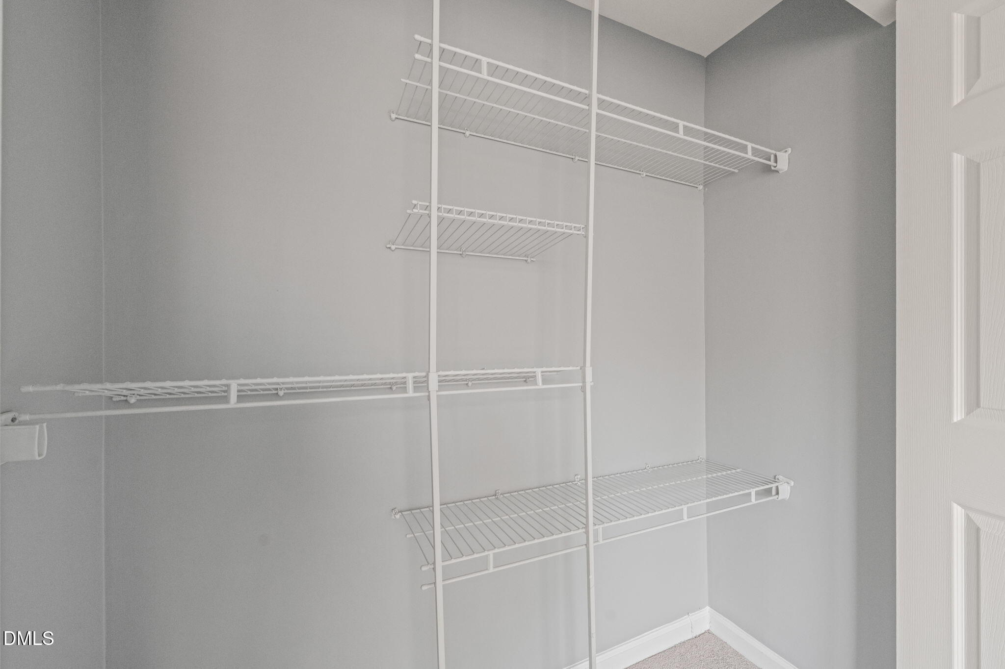 7739 Ohmann Court Raleigh, NC 27615 - Photo 27 of 38 a view of a walk in closet