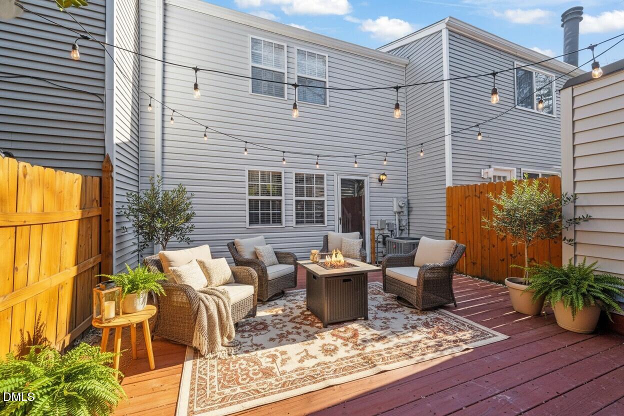 7739 Ohmann Court Raleigh, NC 27615 - Photo 28 of 38 a view of a house with patio