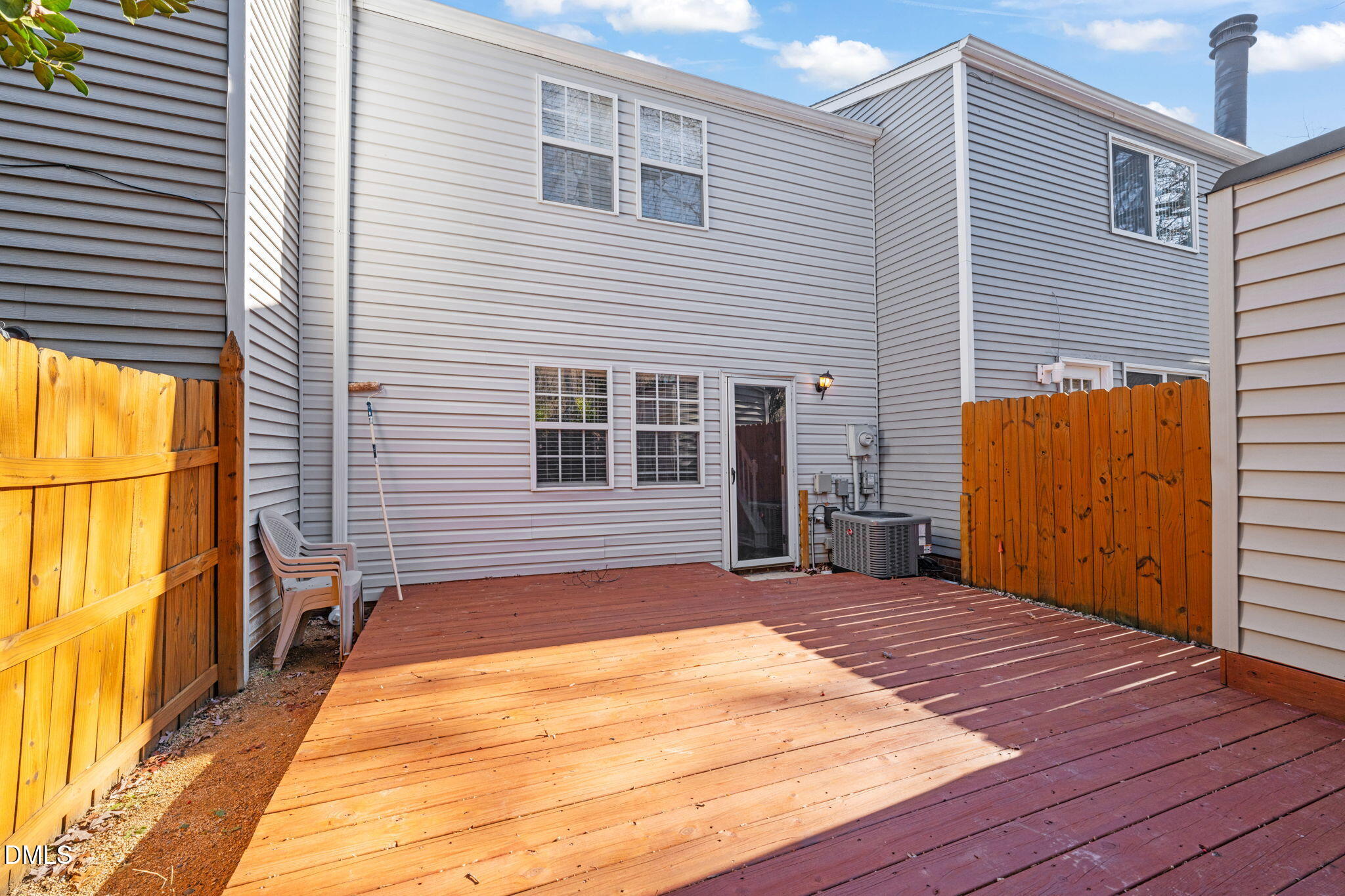 7739 Ohmann Court Raleigh, NC 27615 - Photo 29 of 38 a view of backyard with a wooden deck