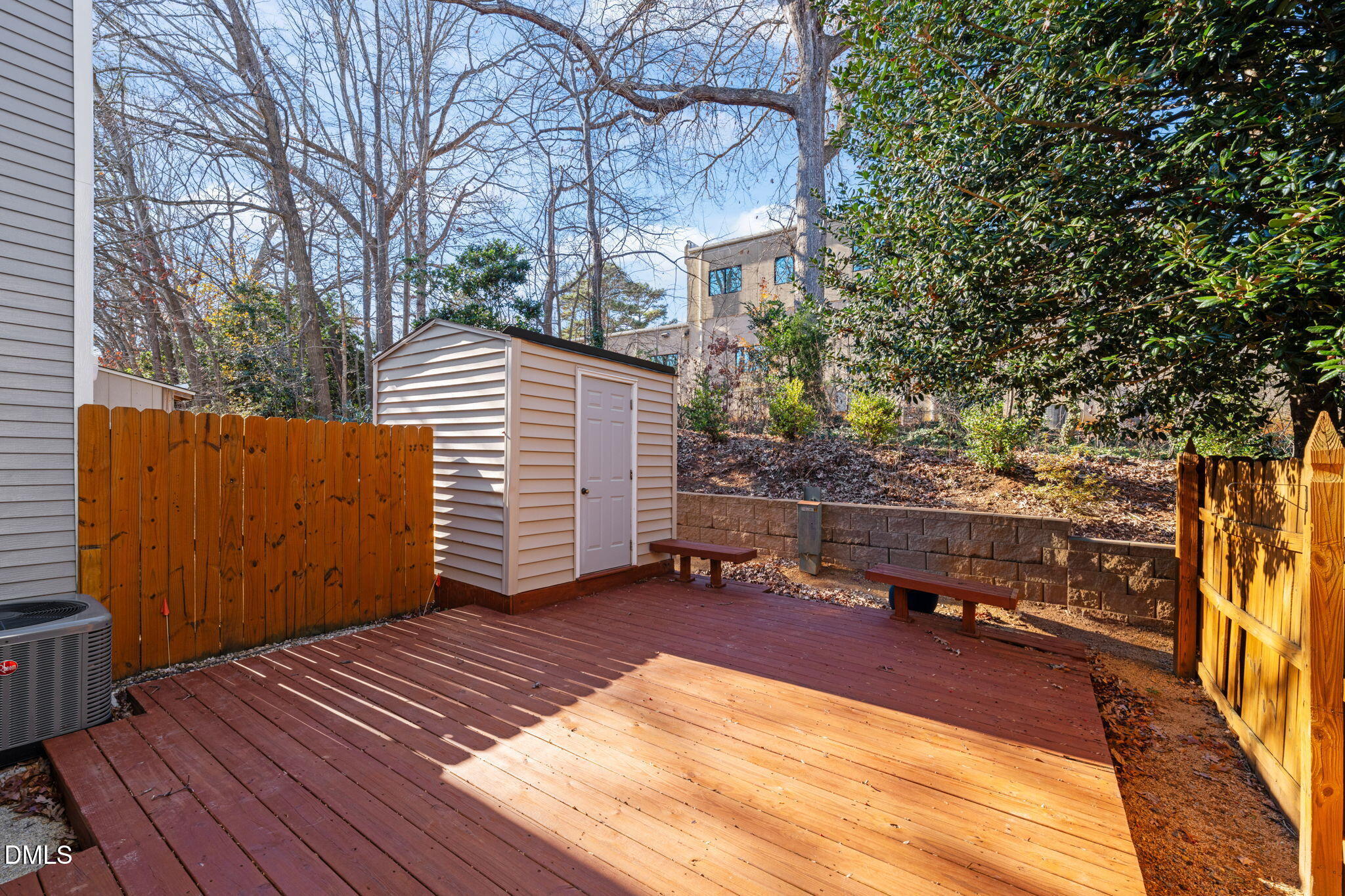 7739 Ohmann Court Raleigh, NC 27615 - Photo 30 of 38 a view of a backyard with sitting area