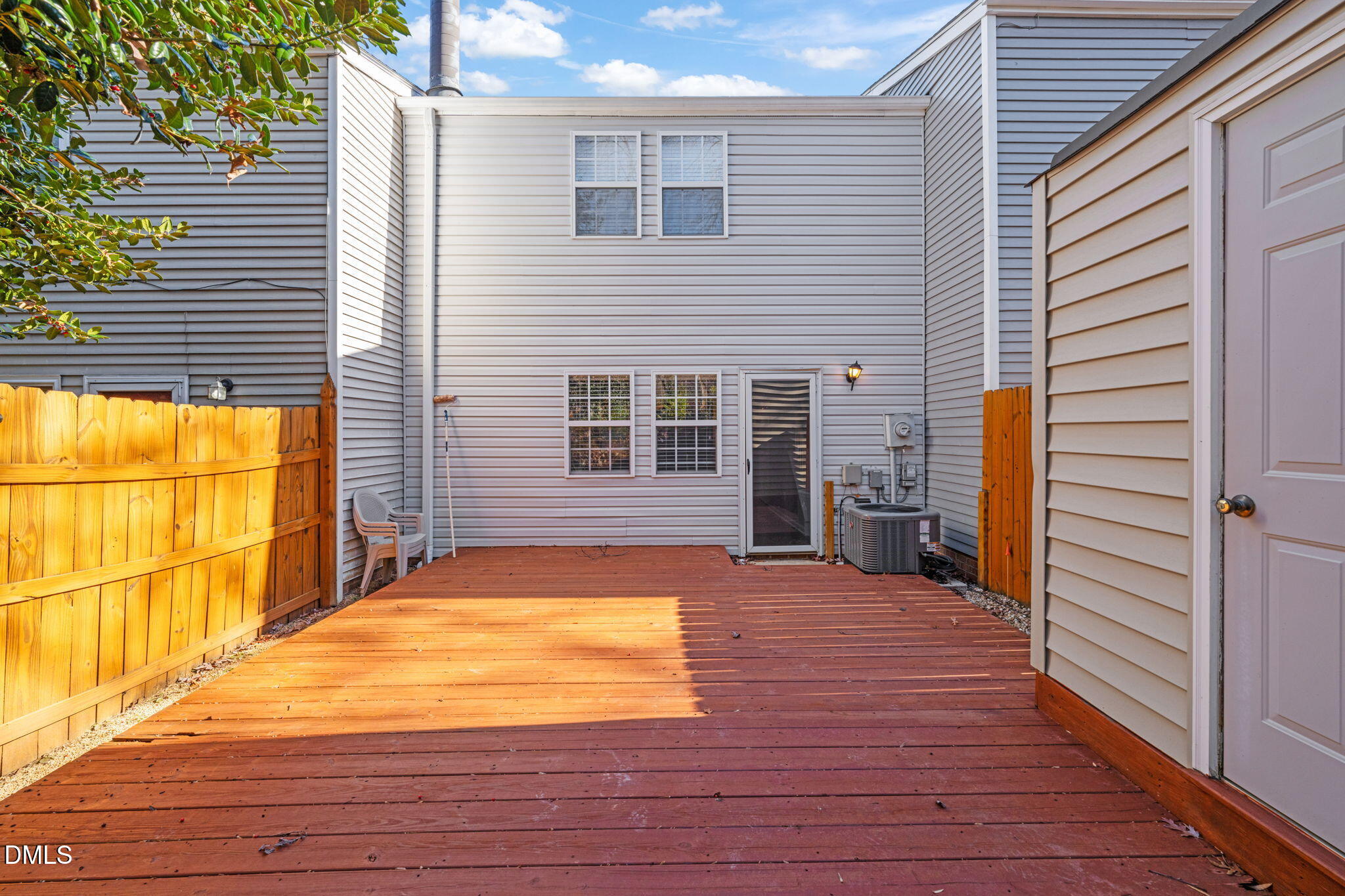 7739 Ohmann Court Raleigh, NC 27615 - Photo 32 of 38 a view of a house with a backyard