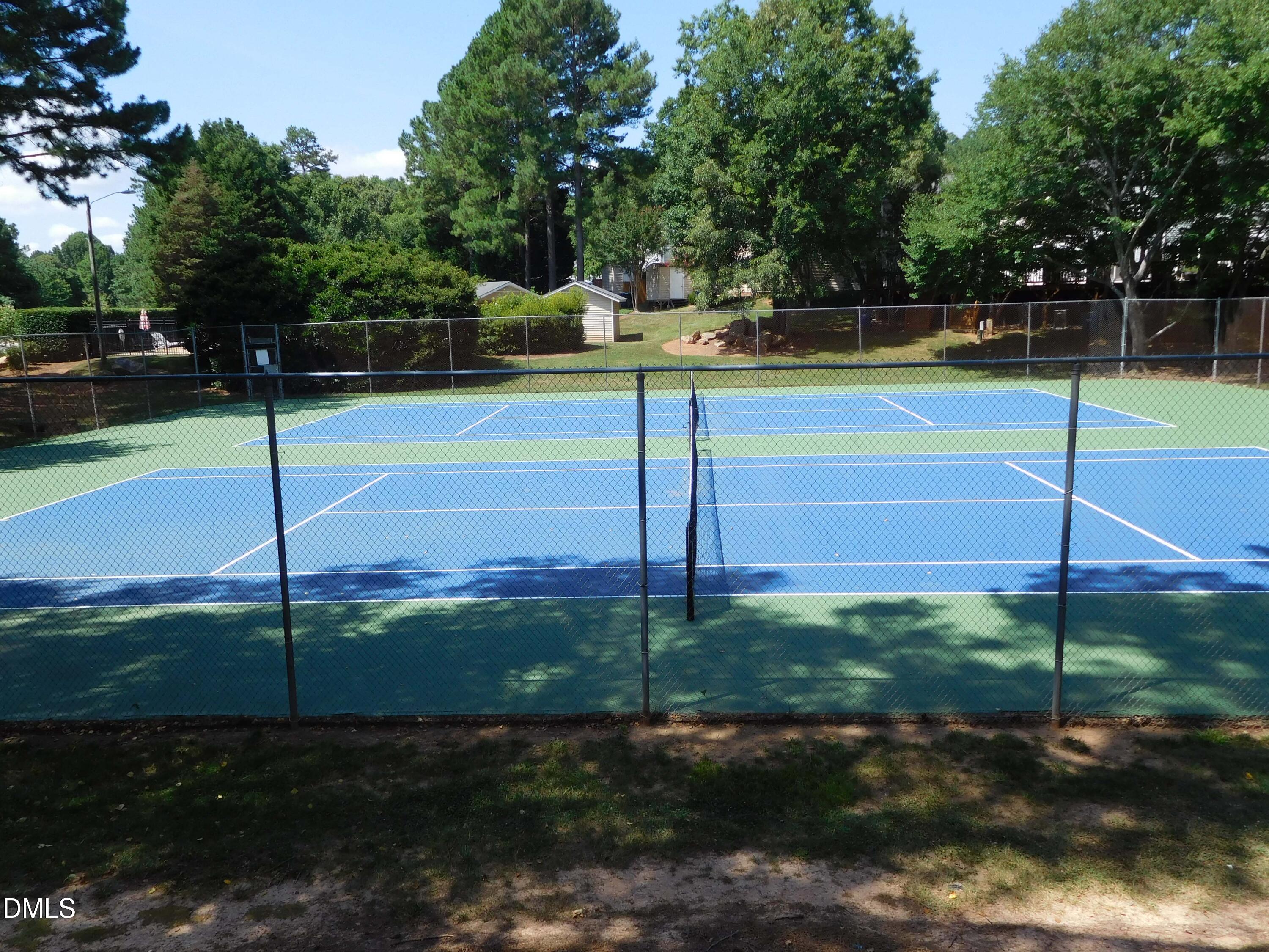 7739 Ohmann Court Raleigh, NC 27615 - Photo 38 of 38 a view of a tennis court