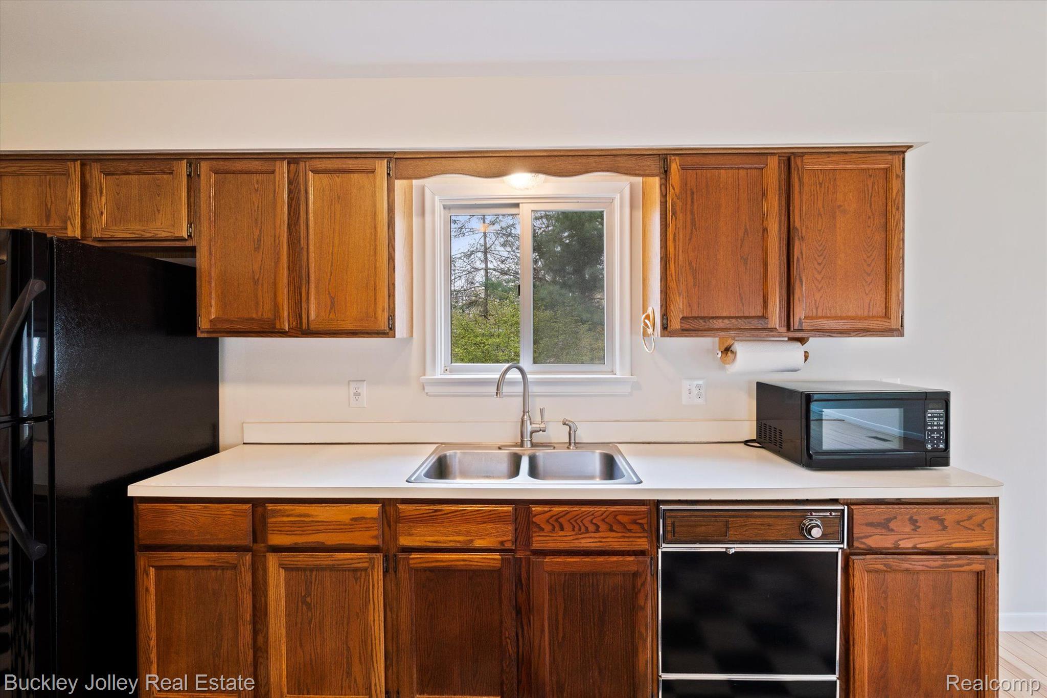 2075 Corlett Road Brighton, MI 48114 - Photo 20 of 28 Sink Overlooks the Yard