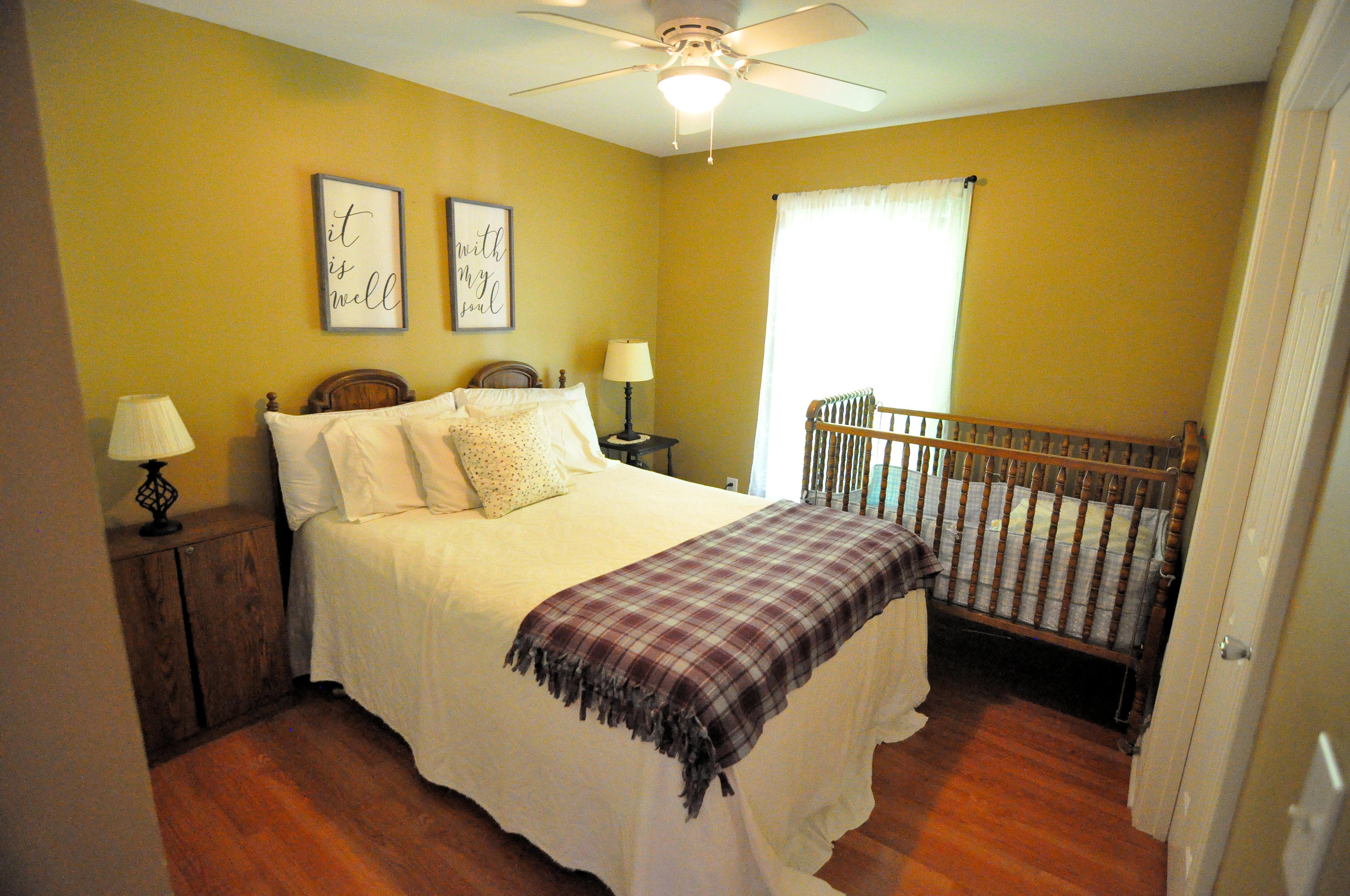 832 Old Henry Road Henry, VA 24102 - Photo 15 of 30 a bed sitting in a bedroom next to a window