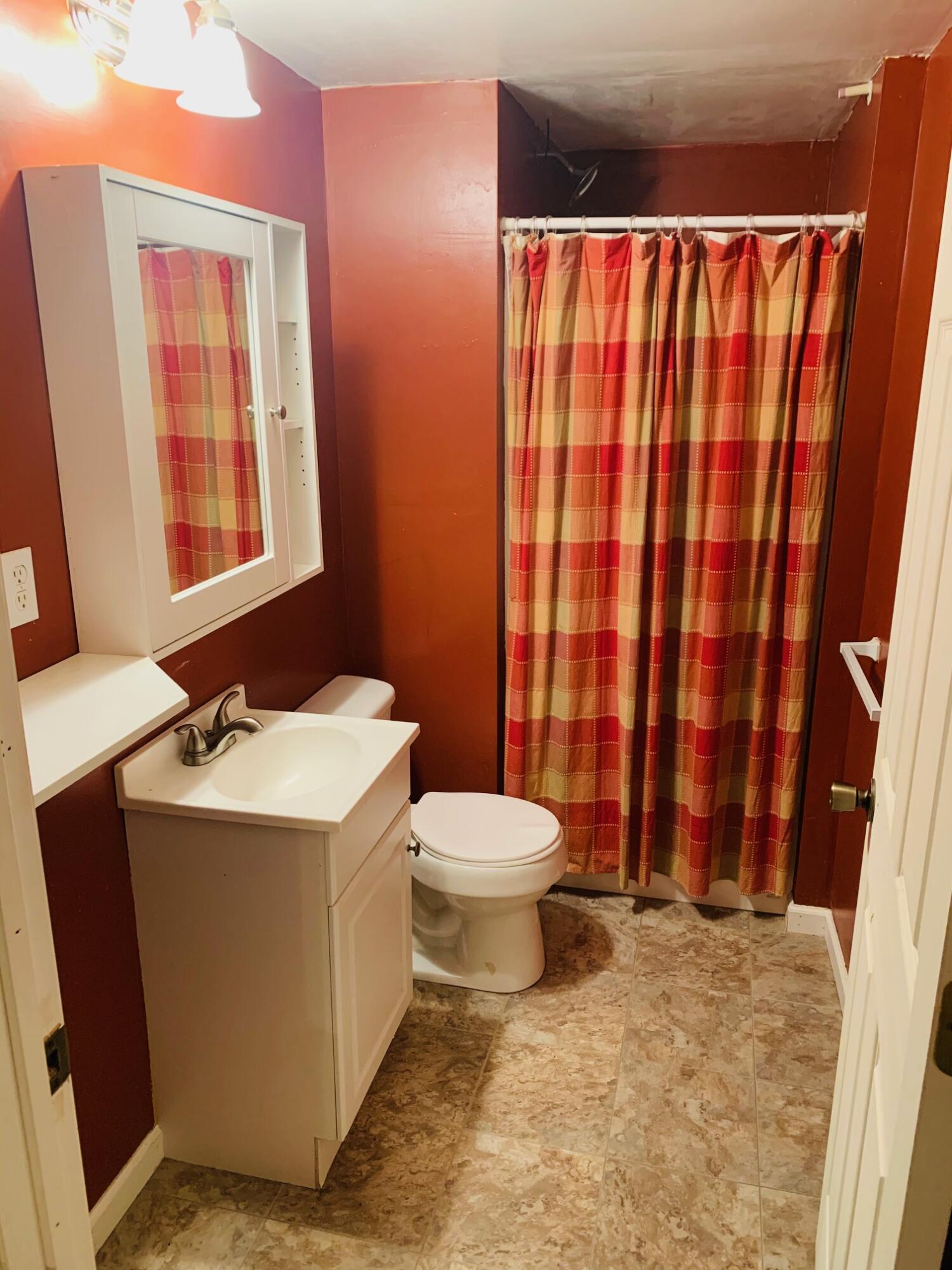 832 Old Henry Road Henry, VA 24102 - Photo 23 of 30 a bathroom with a sink and a toilet