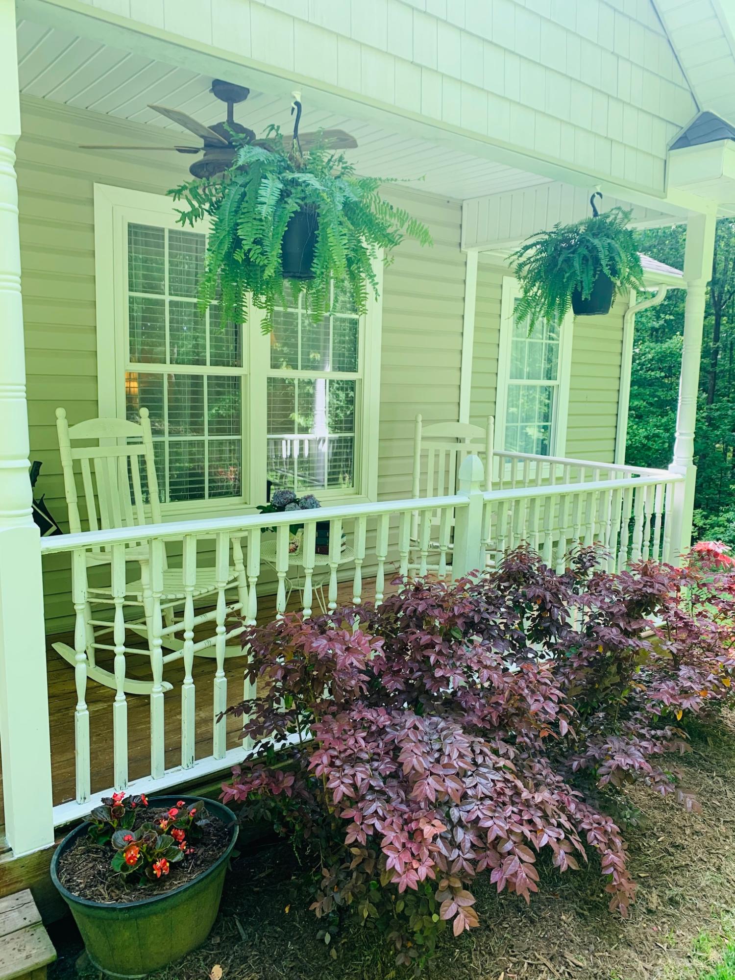 832 Old Henry Road Henry, VA 24102 - Photo 29 of 30 a view of a house with a backyard and a garden
