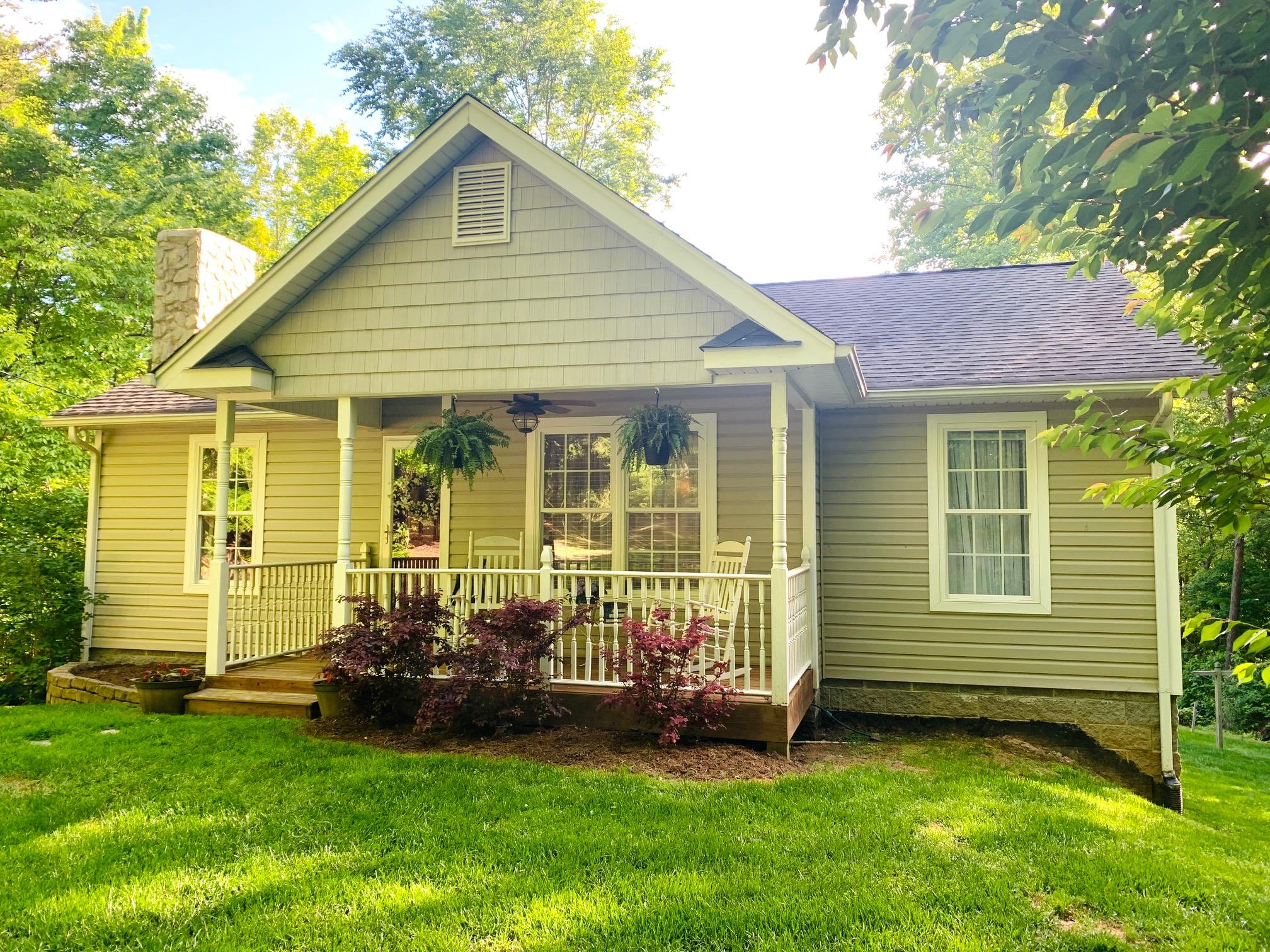 832 Old Henry Road Henry, VA 24102 - Photo 4 of 30 a view of a house with a backyard