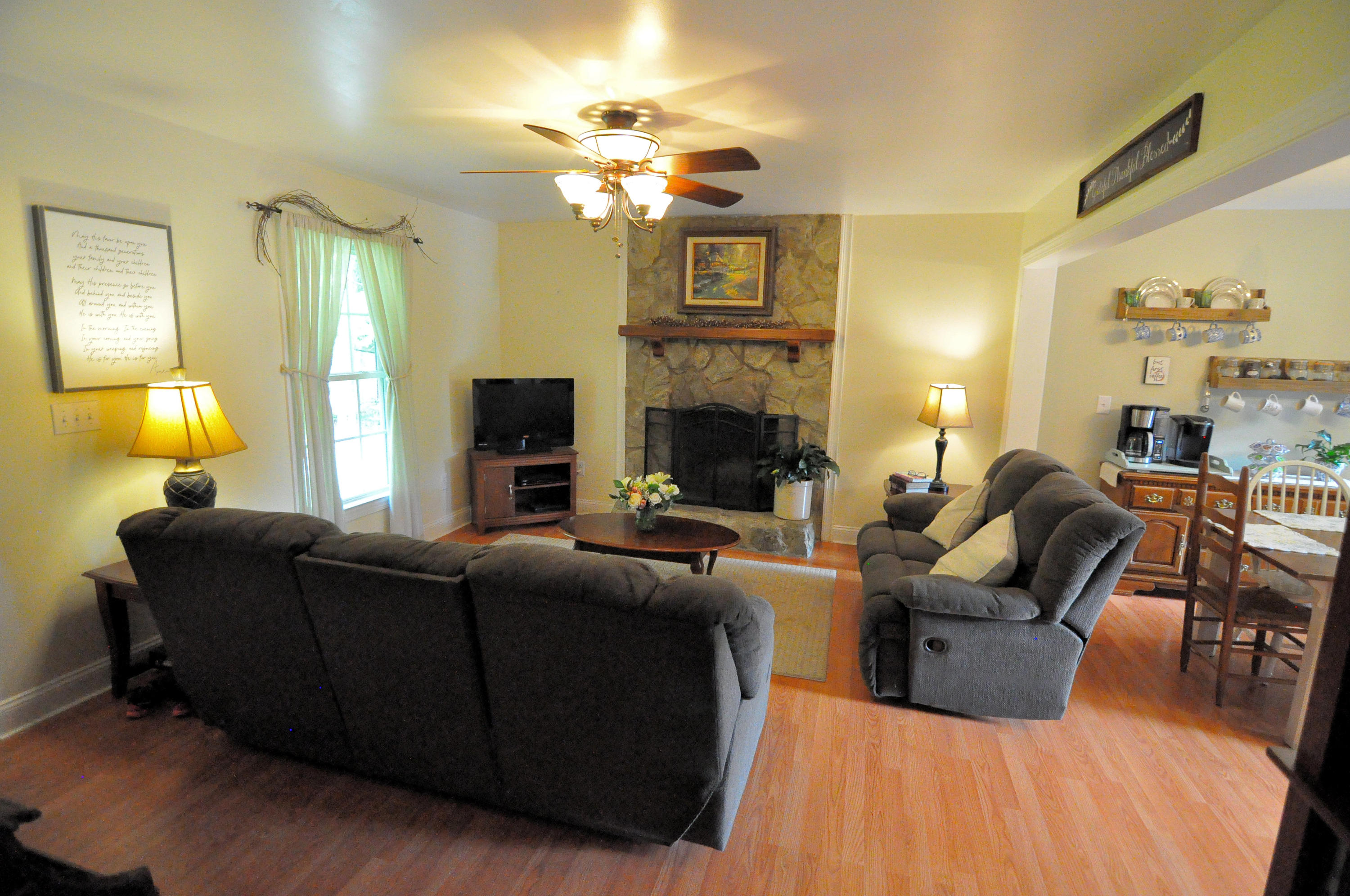 832 Old Henry Road Henry, VA 24102 - Photo 8 of 30 a living room with furniture and a fireplace