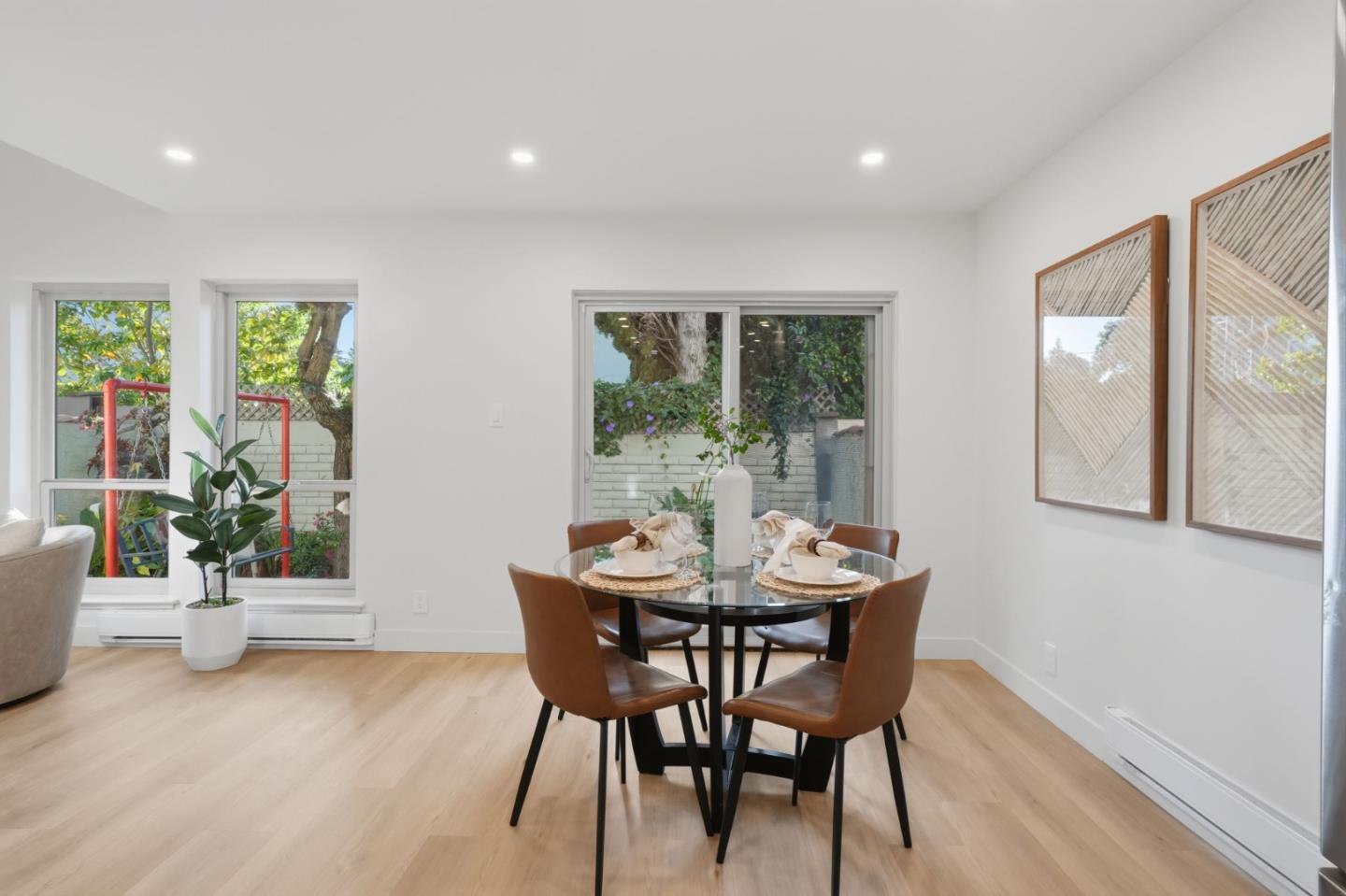 409 Puerto Place Hayward, CA 94541 - Photo 25 of 54 a view of a dining room with furniture and wooden floor