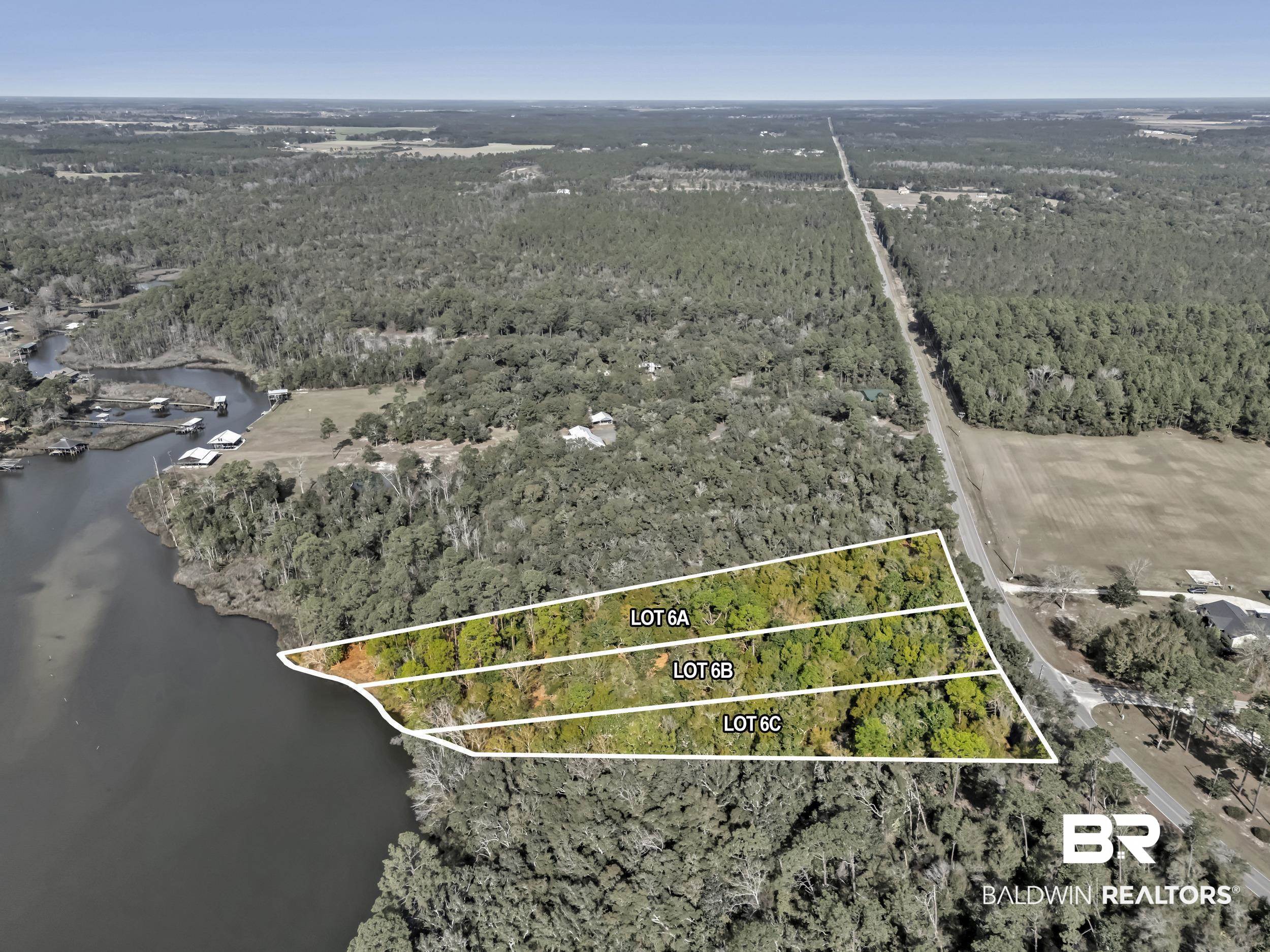 0 County Road 97 Elberta, AL 36530 - Photo 12 of 29 Aerial view of property's location with property boundaries highlighted and a large body of water