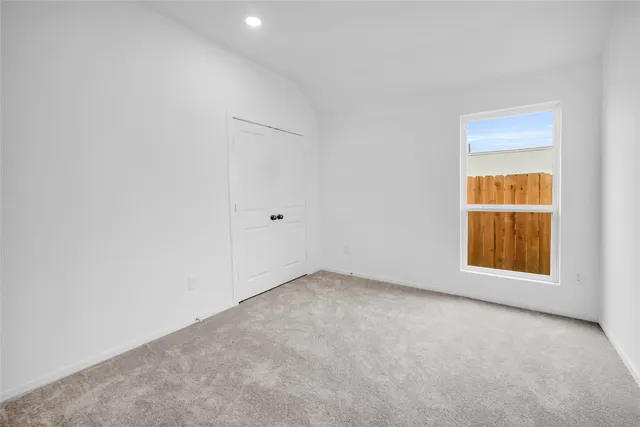 a bathroom with 2 sink tub and a mirror