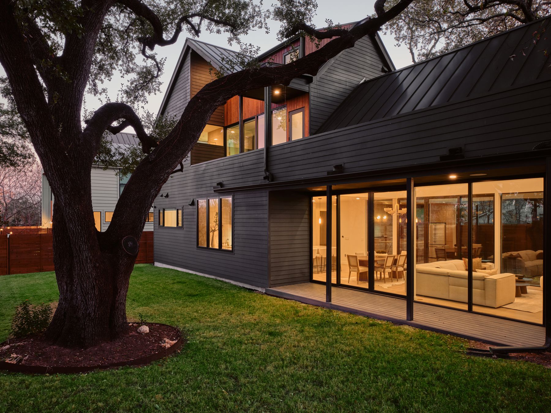 3209 Clawson Road Austin, TX 78704 - Photo 4 of 30 Rear view of property with a standing seam roof and a balcony