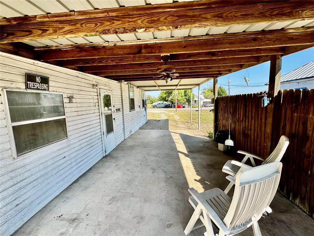 413 East Locust Street Whitewright, TX 75491 - Photo 8 of 16 View of patio / terrace with a ceiling fan