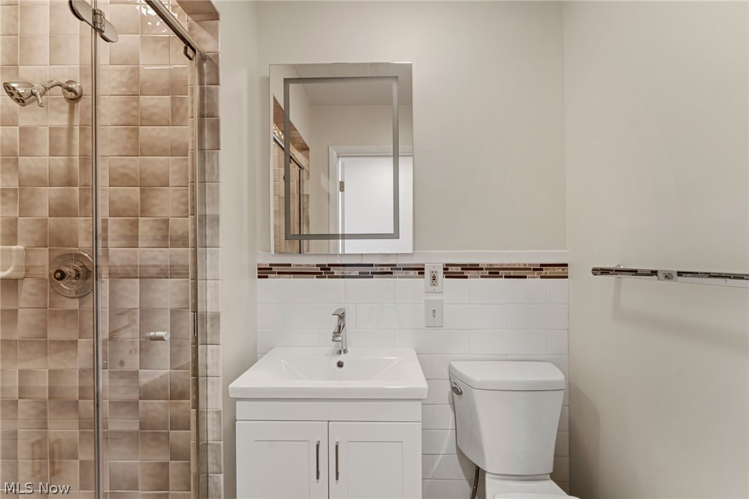 13011 West Lake Road Vermilion, OH 44089 - Photo 8 of 29 1st floor full bath new toilet, new vanity