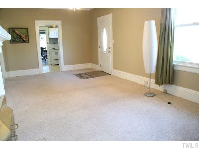 2613 Banks Road Raleigh, NC 27603 - Photo 3 of 12 a view of an empty room with glass door
