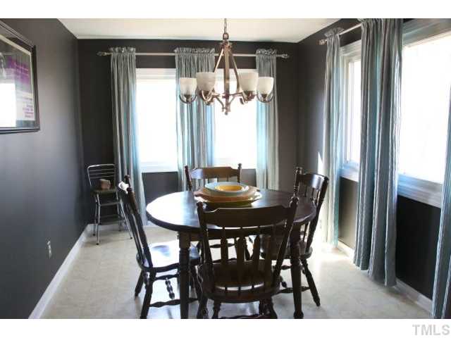 2613 Banks Road Raleigh, NC 27603 - Photo 5 of 12 a view of a dining room with furniture and window