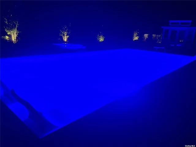 a bathroom with a toilet and shower