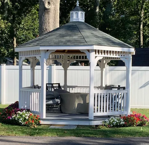 a blue and white sitting area with a sink
