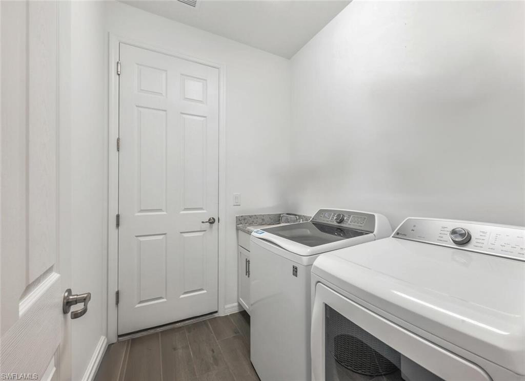 43240 Boardwalk Loop Punta Gorda, FL 33982 - Photo 22 of 41 a utility room with dryer and washer