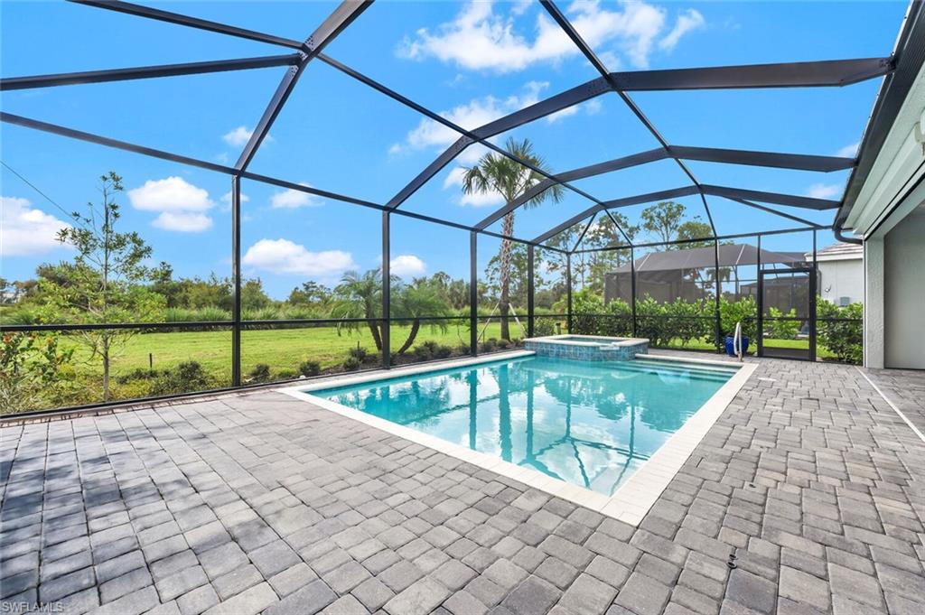 43240 Boardwalk Loop Punta Gorda, FL 33982 - Photo 23 of 41 a view of swimming pool with a patio