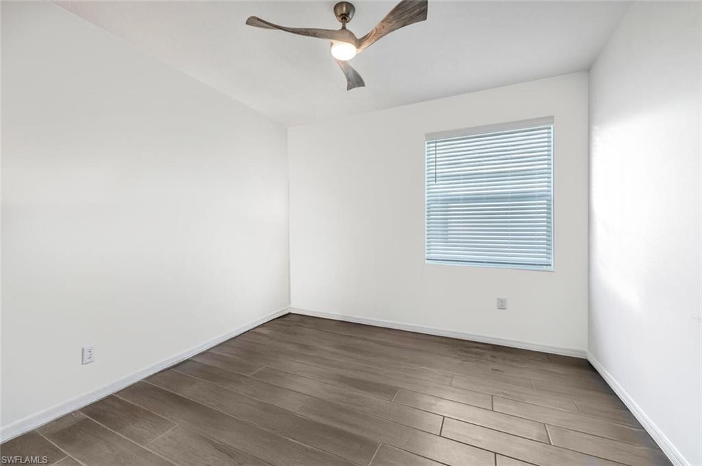 43240 Boardwalk Loop Punta Gorda, FL 33982 - Photo 28 of 41 an empty room with a window and ceiling fan