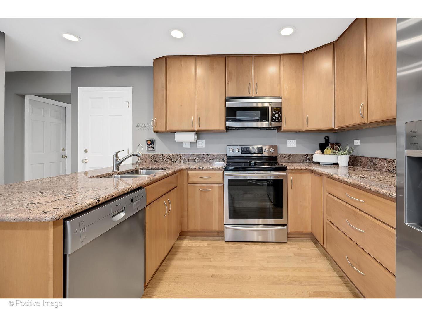 3672 Venard Road Downers Grove, IL 60515 - Photo 11 of 44 a kitchen with granite countertop a sink stainless steel appliances and cabinets